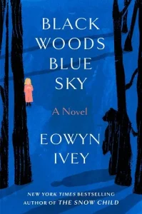 Image of the book cover. Blue background with black trees, and bear silhouette, and a girl in an orange coat.